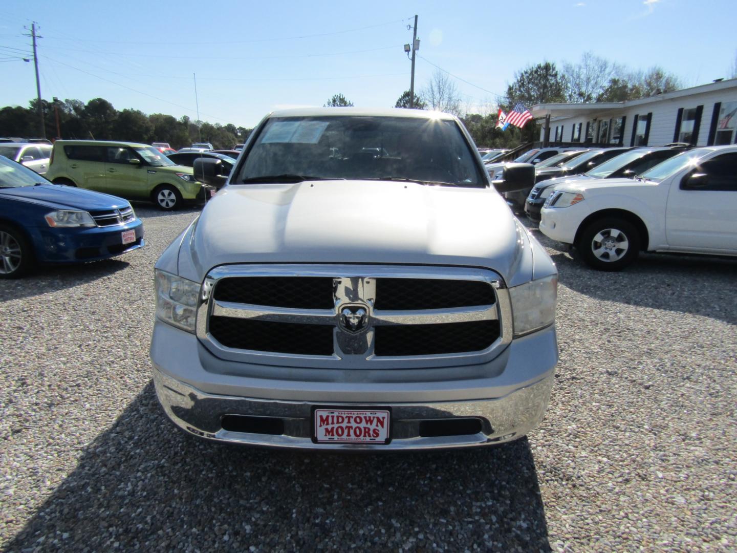 2013 Silver RAM 1500 SLT Crew Cab 2WD (1C6RR6LG9DS) with an 3.6L V6 engine, Automatic transmission, located at 15016 S Hwy 231, Midland City, AL, 36350, (334) 983-3001, 31.306210, -85.495277 - Photo#1
